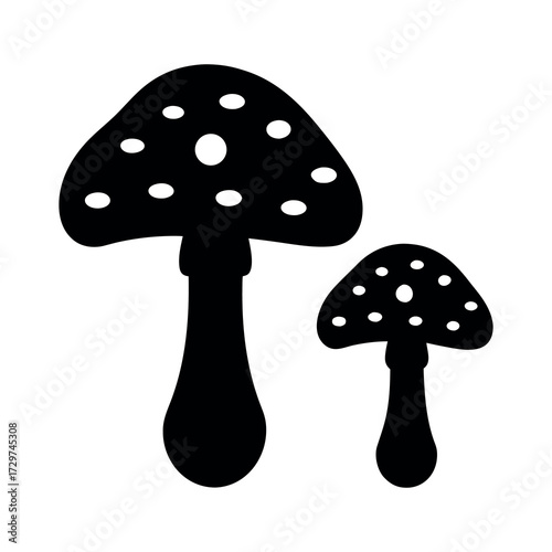 Two silhouetted amanita muscaria mushrooms with white spots on a white background
