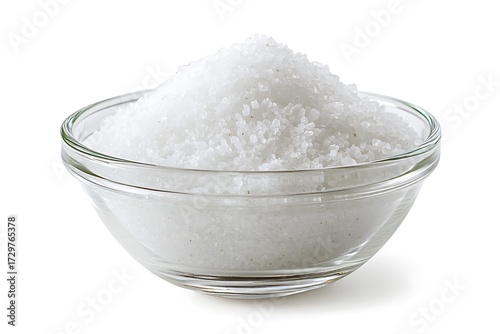 Sea Salt Crystals Heap in Glass Bowl on White Background, CloseUp Texture Shot