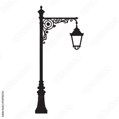 Intricate Silhouette of a Victorian Era Streetlight Illuminating the Night with Ornate Details and Classic Elegance