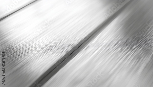 Modern abstract silver metal texture background with dynamic lines and subtle light reflections, perfect for sleek design projects