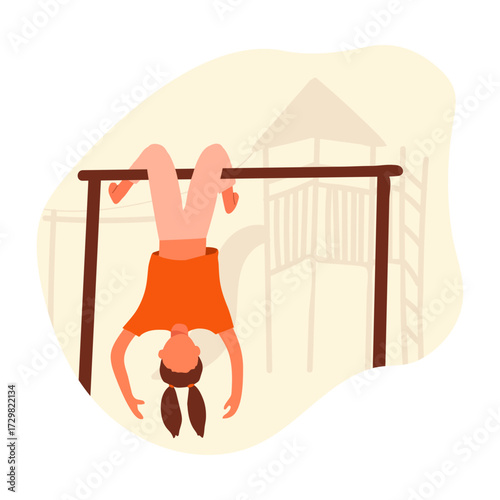 Young girl hanging upside down on a playground bar, enjoying outdoor playtime fun