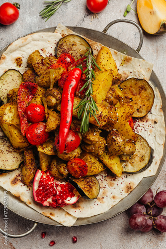 Caucasian barbecue table with grilled vegetables and spices