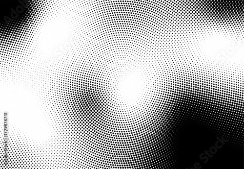 Black and white abstract halftone pattern with dots and circles for a digital texture illustration design element