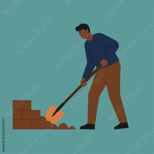A man is digging soil to lay a foundation for a brick wall while wearing brown pants and a blue shirt on a muted blue background.
