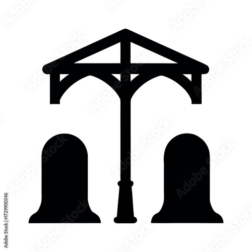 Silhouette of a victorian style gazebo with two ornate tombstones in a cemetery setting