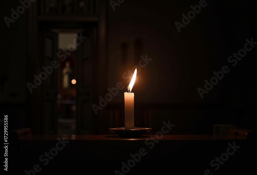 Serene Candle Illuminating a Dimly Lit Room with an Open Doorway Leading to a Subtly Visible Sacred Figurine