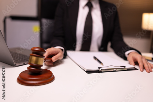 Female lawyer in office, Corporate lawyer at workspace, Attorney with legal books and gavel,