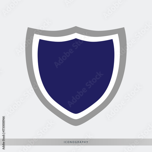 Sleek shield icon in blue and grey for security branding, product protection, or trustworthy designs, conveying safety and strength with a modern touch