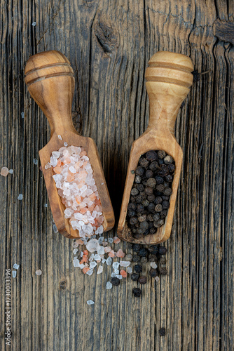 Natural spices on a rustic wooden background