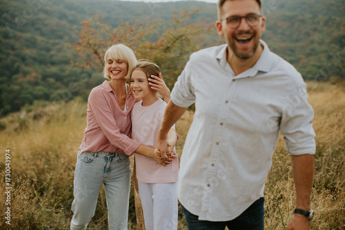Family enjoying a joyful mo...