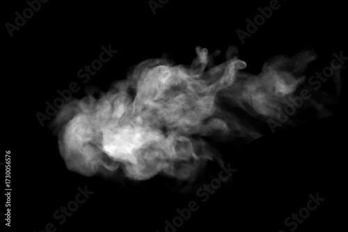 Fototapeta White smoke isolated on black background, abstract cloud texture rising in the air, symbol of pollution, steam, mystery, and atmosphere effect for design, environment, or creative concepts