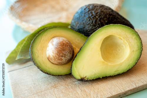 Green ripe avocado fruits from organic avocado plantation - healthy vegan and vegetarian food
