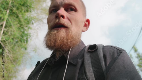 Traveler Europian blogger man travel in Bali, Indonesia, male using mobile phone make vlog