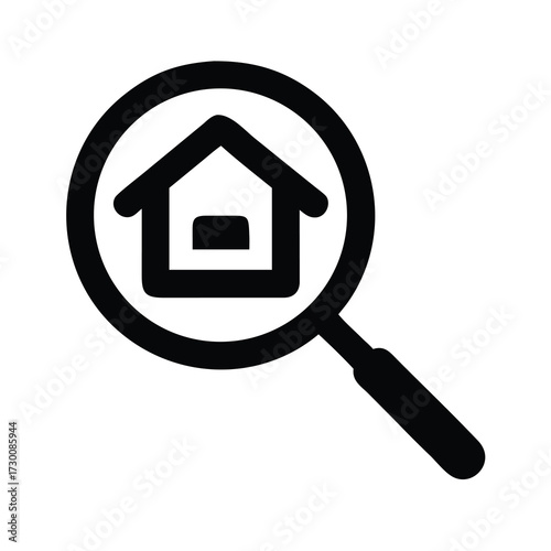 Magnifying glass focusing on house symbol representing property search real estate inspection home buying