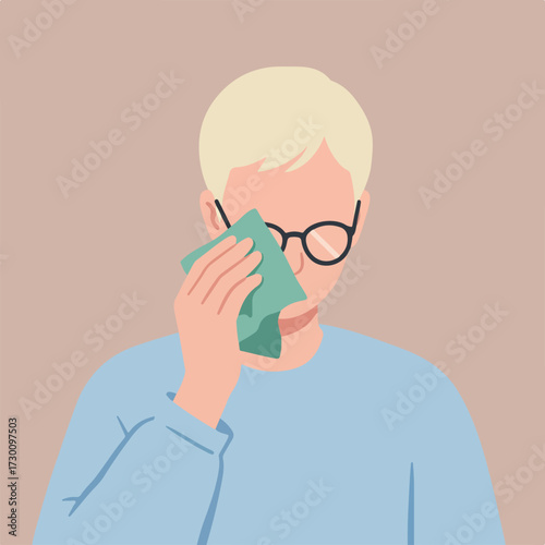 Person wipes face with cloth