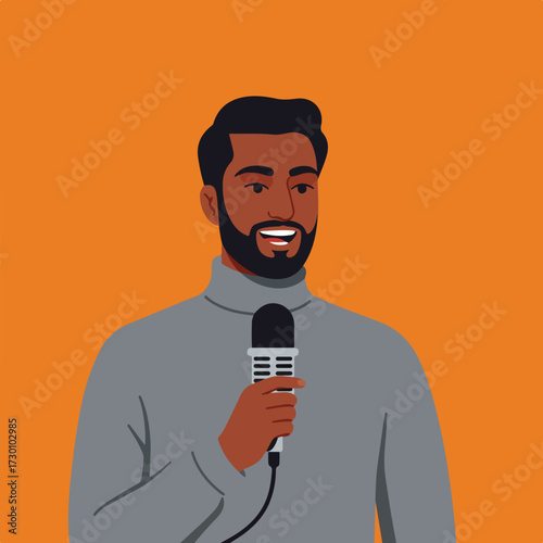 Person with dark hair speaking into microphone, orange background