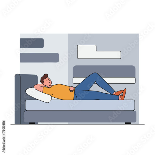 Man reclines on bed with hand behind his head, wearing orange shirt, blue pants