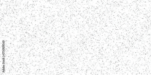 Abstract grayscale mosaic pattern with a dense distribution of small irregular shapes, providing a subtle textured background for creative design
