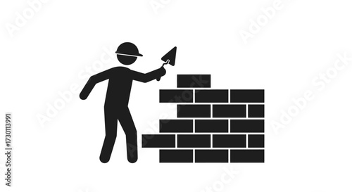 A man standing on a wall