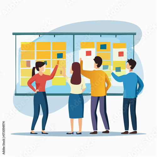 A group of four people are collaborating on a project, using sticky notes on a glass board to brainstorm and organize ideas.