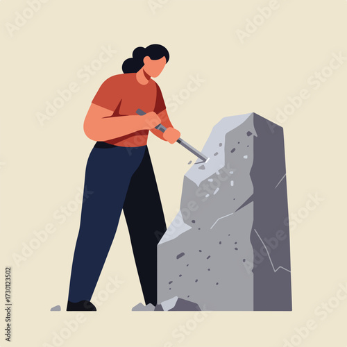 Woman chisels at large stone