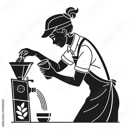 Female worker grinding coffee beans