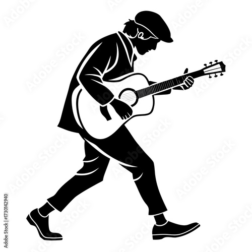 Silhouette of a man playing guitar