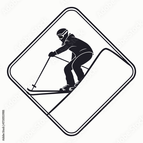 Silhouette of a skier skiing downhill in a frame