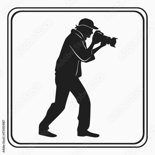 Silhouette of a photographer taking a picture