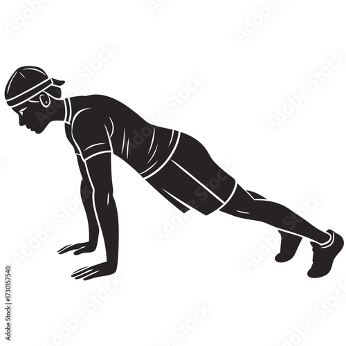 Silhouette of a young man performing a push up exercise wearing a bandana and athletic shorts and shirt