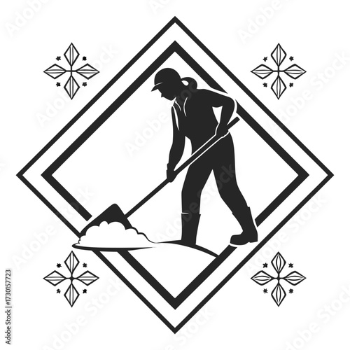 Silhouette of a construction worker wearing a hard hat and boots shoveling dirt or snow within a diamond frame adorned with decorative floral motifs on each side