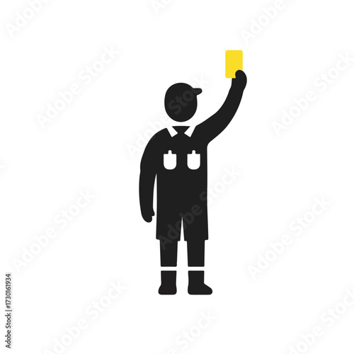 A referee in black raising a yellow card in the air