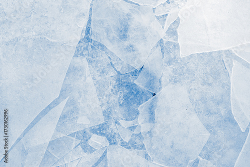 Shards of a crushed thin ice in a light-blue tones. Background texture.