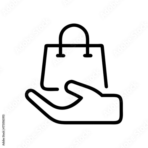 Hand holding shopping bag as a modern icon concept  
