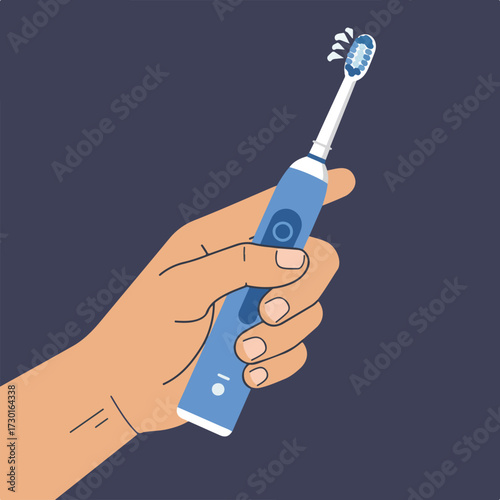Hand holding a blue electric toothbrush with white bristles and water droplets