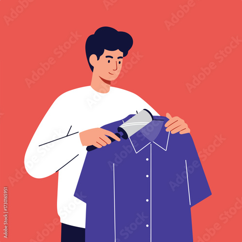 Person uses lint roller on blue shirt