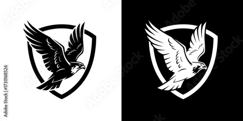 A black and white illustration of a falcon in flight, set against a shield emblem, shown on both a white and black background.