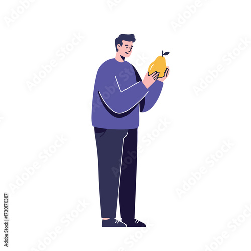 Man admiring a yellow pear, holding it in both hands with a smile