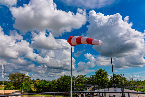 Billede på lærred Windsock indicator of wind on tank chemical cone indicating wind direction and force