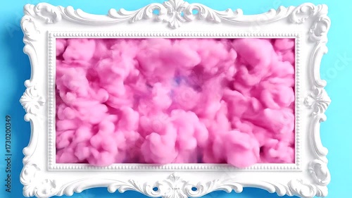Pink Cotton Candy in a White Ornate Frame on a Blue Background.