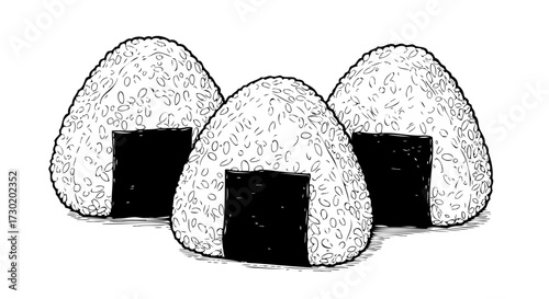 Three triangular rice balls wrapped in seaweed are lined up.