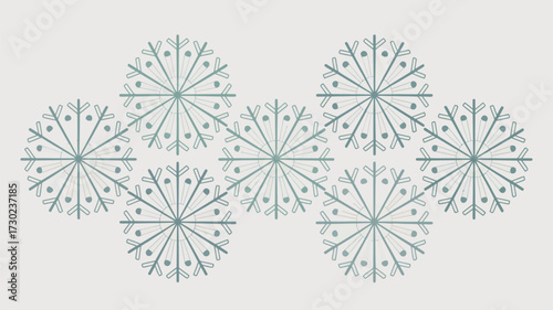 Seven snowflakes arranged in a zigzag pattern on a light background forming a wintery design look