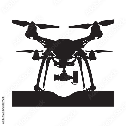 Silhouette of a quadcopter drone with a camera suspended from its frame, hovering above a ground surface