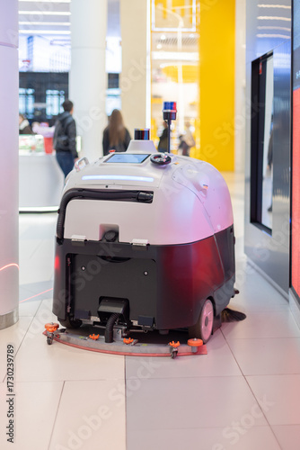 Autonomous robot cleaner for professional floor cleaning in large public spaces, modern cleaning services with artificial intelligence