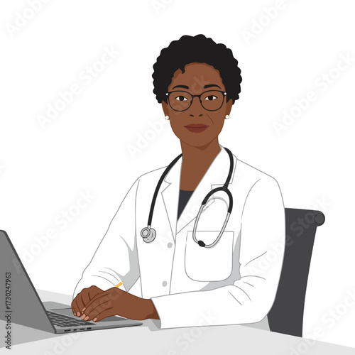 Black female doctor working at her computer