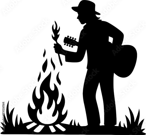 Silhouette of a Musician Playing Guitar by a Campfire