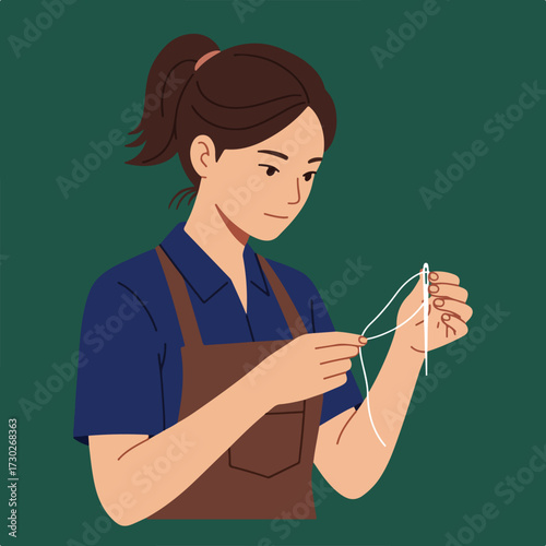 Woman threading a needle, wearing an apron, against dark green backdrop