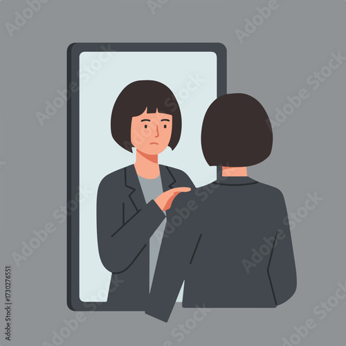 Woman comforts self in a mirror, wearing suit, face showing concern