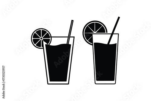 Two glasses of dark liquid with citrus slices a striking silhouette