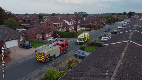 Drone. Fire engine and ambulance in urban street setting. 